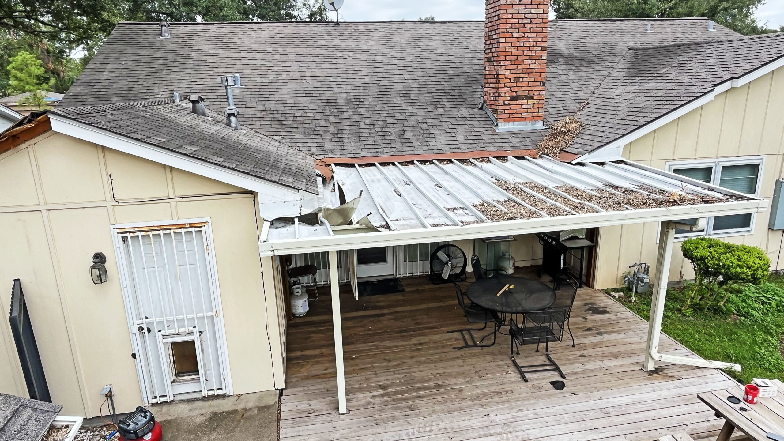 broken aluminum patio cover before remodeling