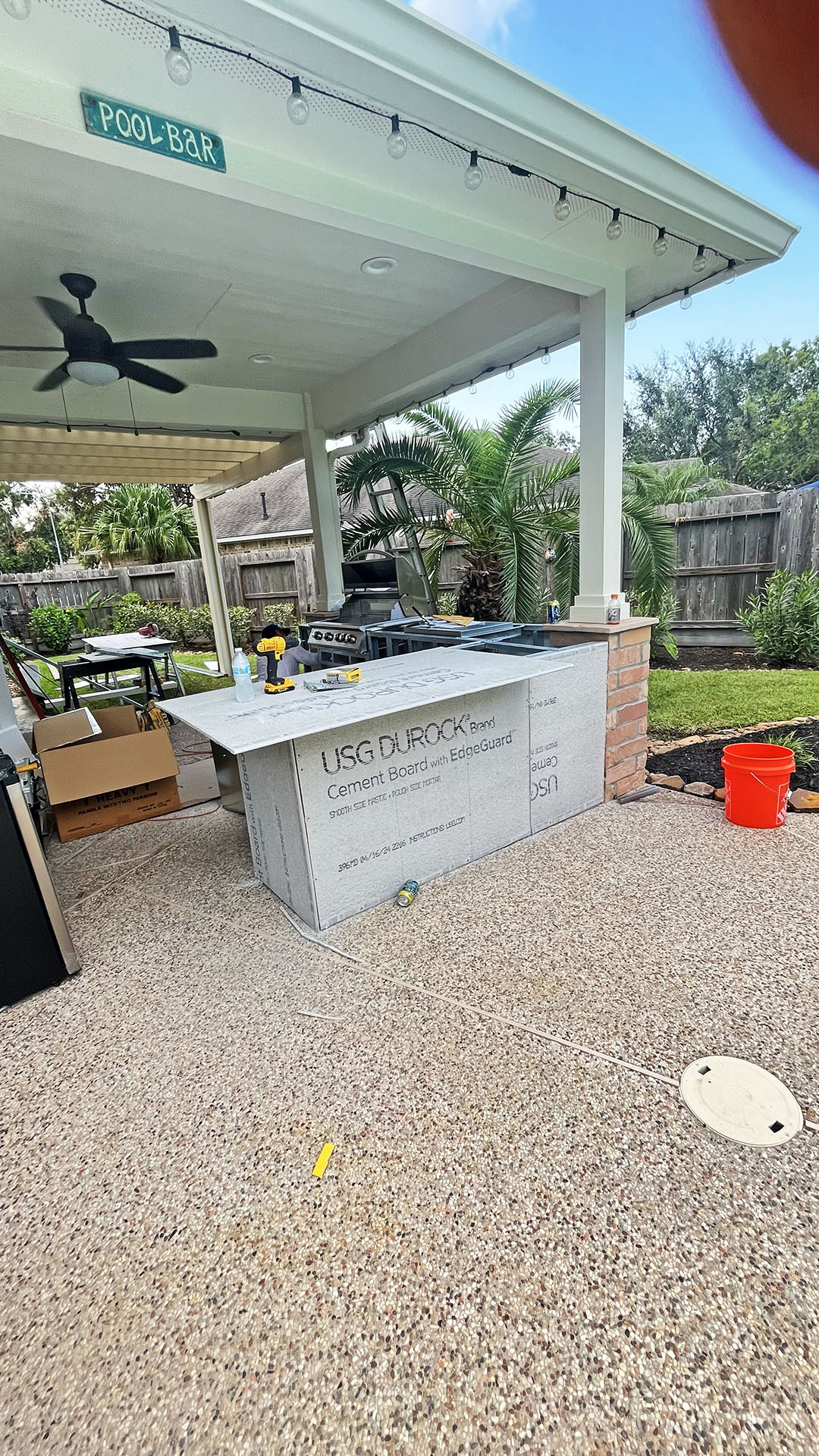 Outdoor kitchen construction in Pareland Texas showing the kitchen almost competed and the counter tops.